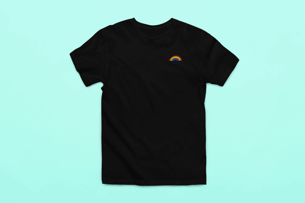 black t-shirt with a rainbow on it