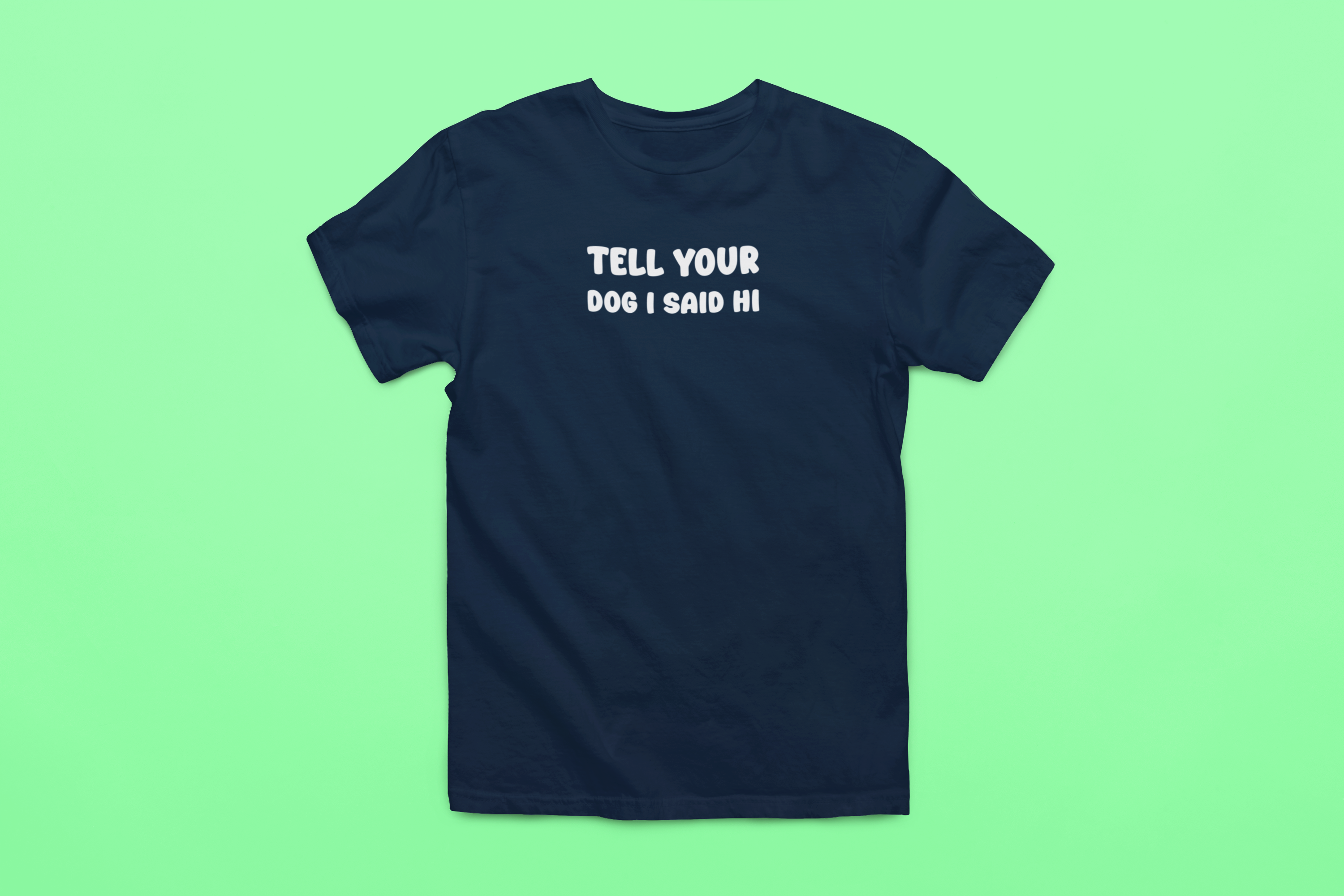 white t-shirt with "tell your dog i said hi" on it